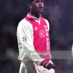 DORTMUND, GERMANY - MARCH 06: Patrick Kluivert of Ajax is seen during the UEFA Champions League quarter final first leg match between Borussia Dortmund and Ajax at the Westfalenstadion on March 6, 1996 in Dortmund, Germany. (Photo by Etsuo Hara/Getty Images)